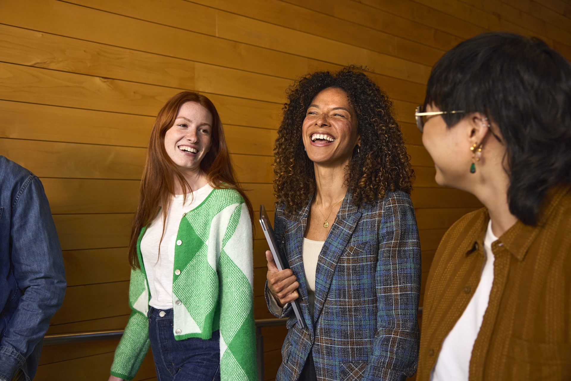 Group of people talking and laughing