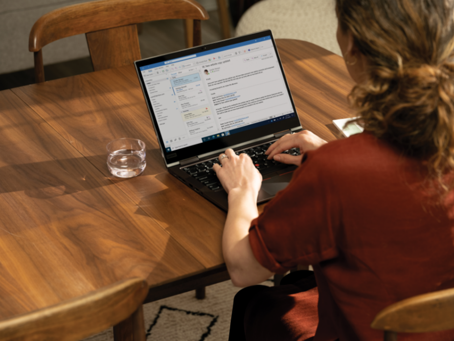 Future of work includes remote working: A person sitting at a table with a laptop