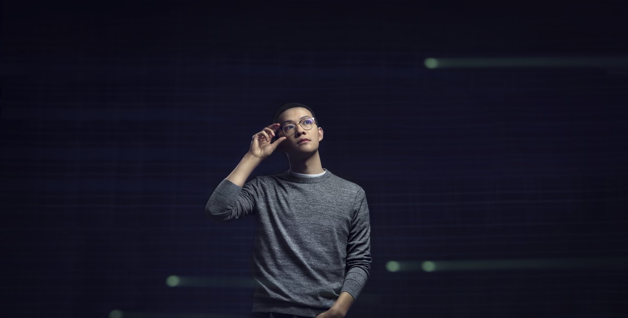 Asian male developer standing hero portrait with Azure geometries as textures in the background, code, developer, engineer, Azure