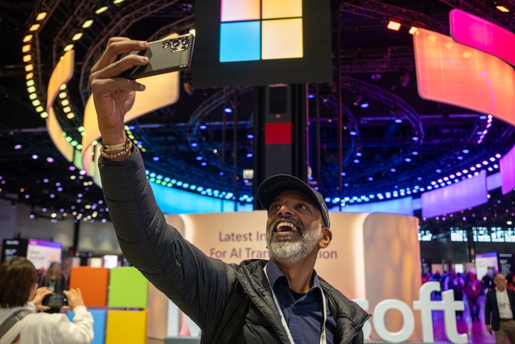 A man taking a selfie at a Microsoft security event