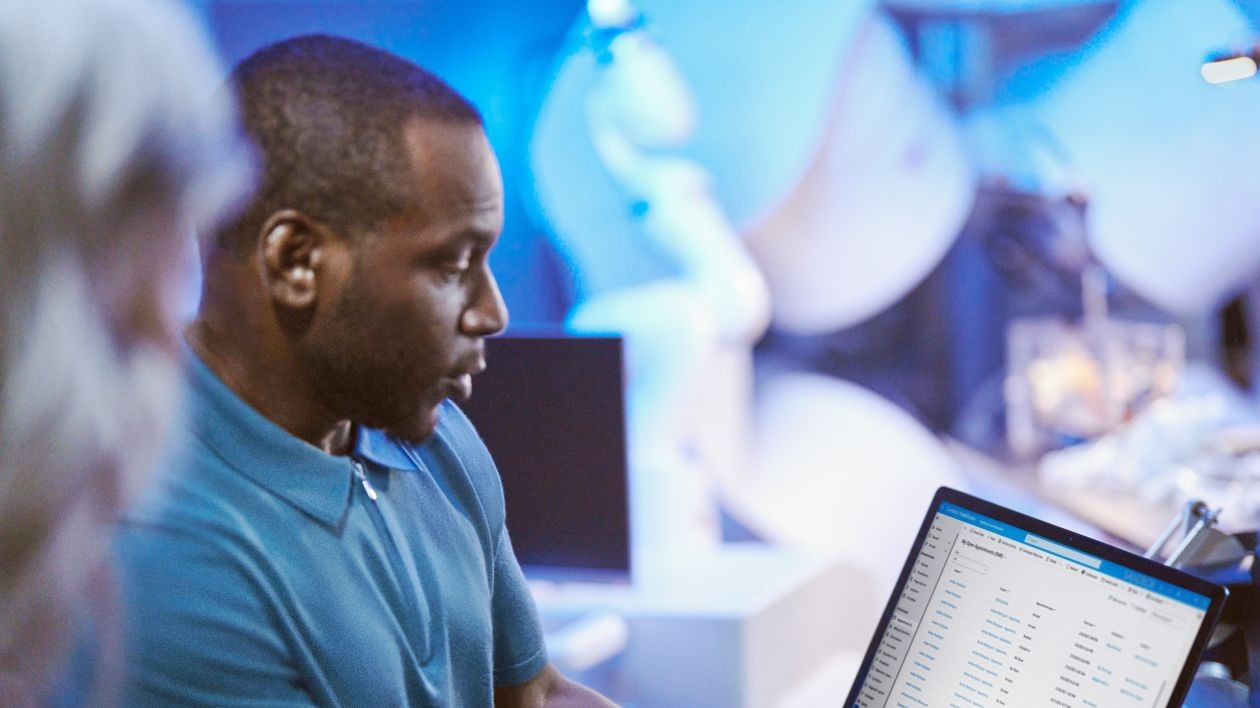 In a healthcare setting, researchers collaborate in a medical treatment room