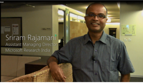 Sriram Rajamani standing in a room