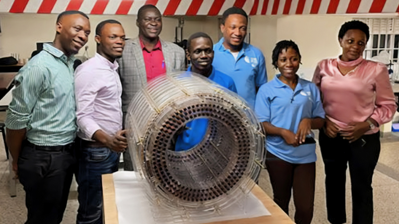 Tyger - portable MRI story: group of people standing next to a piece of equipment