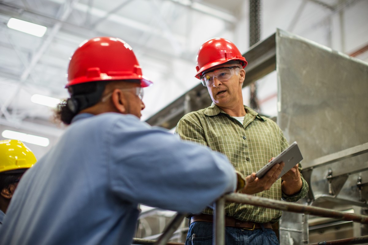 Operations manager meets with a shop foreman