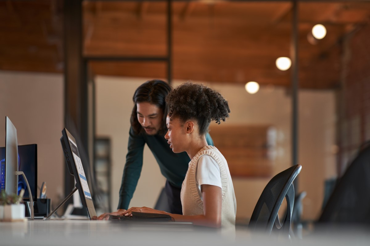 Enterprise office workers collaborating in an open work space