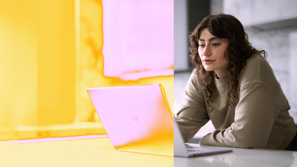 Person sitting at laptop computer