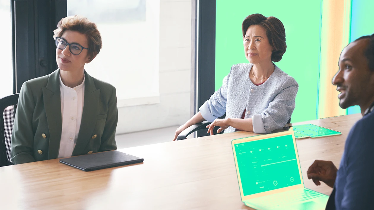 Two women sitting at a conference table