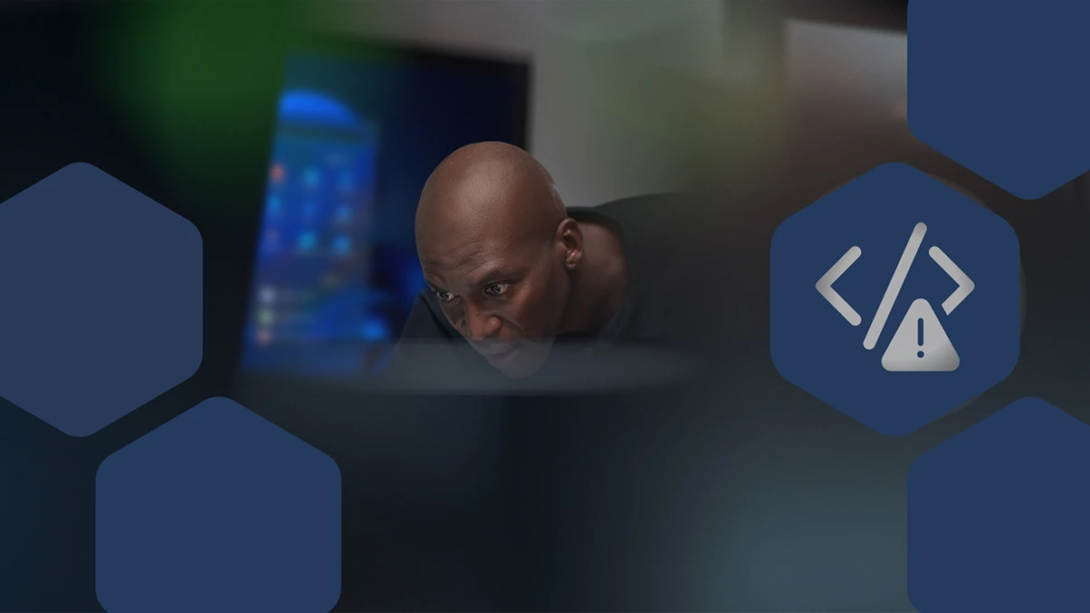 Close-up view of focused CISO (chief information security officer) at work in a security operations center